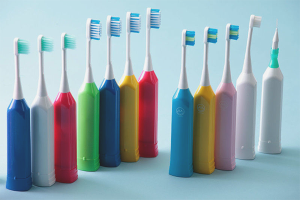 Paano pumili ng isang electric toothbrush